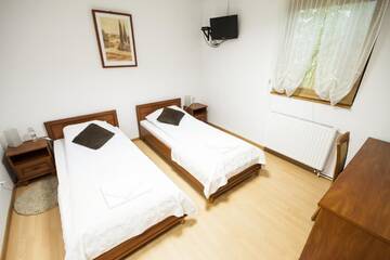 Фото номера Двухместный номер с 2 отдельными кроватями Отель Motel Te Klimaty г. Челядзь 2